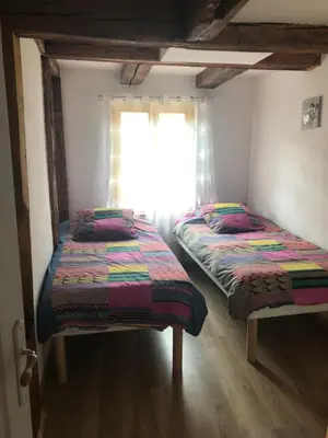 Un ou plusieurs lits dans un hébergement de l'établissement Gîte Elisa et Léna