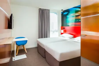 Un ou plusieurs lits dans un hébergement de l'établissement Ibis Styles Mulhouse Centre Gare