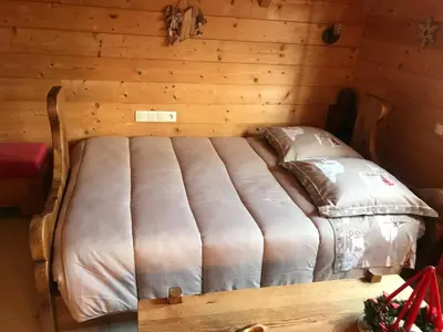 Un ou plusieurs lits dans un hébergement de l'établissement Chalet Colline et Lou