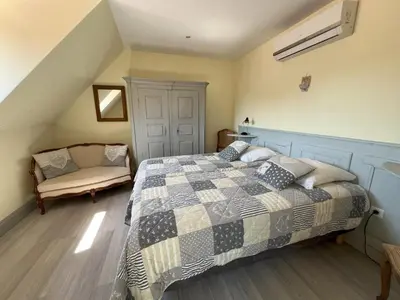 Un ou plusieurs lits dans un hébergement de l'établissement Gîte chez Marie-Sarah petite maison calme parking