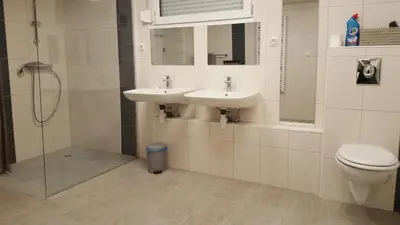 Salle de bains dans l'établissement Gite grand format