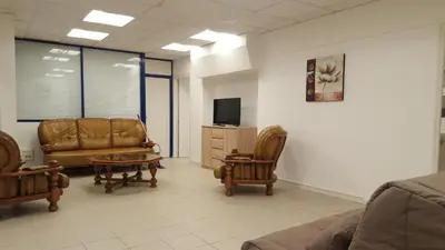 Coin salon dans l'établissement Gite grand format