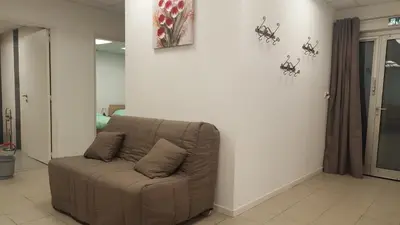 Coin salon dans l'établissement Gite grand format