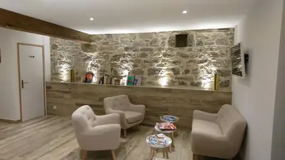 Coin salon dans l'établissement Le Moulin d'Oscar & Spa - Mulhouse Nord