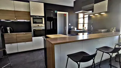 Cuisine ou kitchenette dans l'établissement Le 21