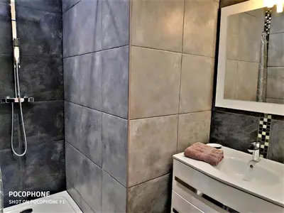 Salle de bains dans l'établissement Le 21