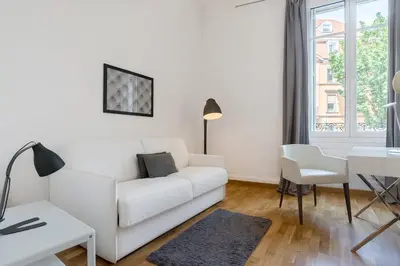 Coin salon dans l'établissement Luxueux Appartement Haussmannien Centre Ville