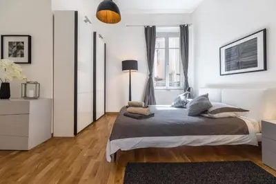 Un ou plusieurs lits dans un hébergement de l'établissement Luxueux Appartement Haussmannien Centre Ville