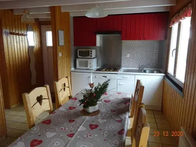 Cuisine ou kitchenette dans l'établissement La Bresse Hautes Vosges Chalet Le Podent