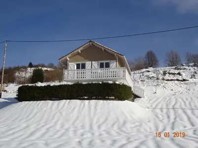 L'établissement La Bresse Hautes Vosges Chalet Le Podent en hiver