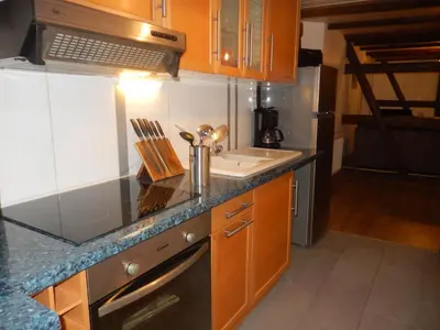 Cuisine ou kitchenette dans l'établissement Gîte Pinot