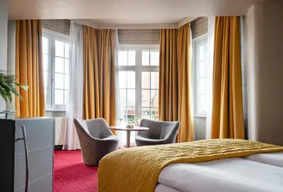 Un ou plusieurs lits dans un hébergement de l'établissement Grand Hôtel Bristol By Stay Collection