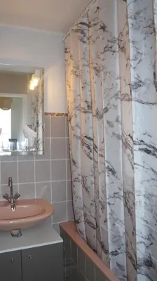 Salle de bains dans l'établissement L&R Gérardmer