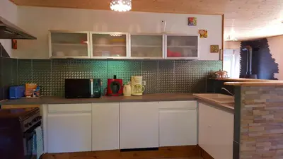Cuisine ou kitchenette dans l'établissement Gite Eden