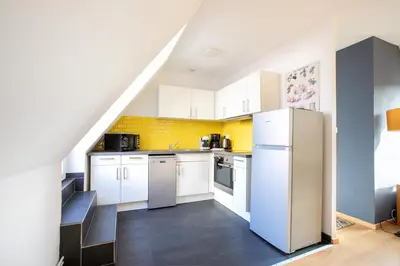 Cuisine ou kitchenette dans l'établissement Gîte 