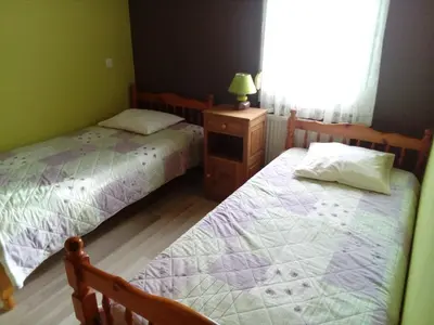 Un ou plusieurs lits dans un hébergement de l'établissement Gîte De La Belle Vallée