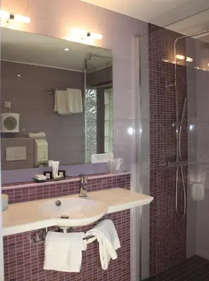 Salle de bains dans l'établissement Hôtel Restaurant Taillard