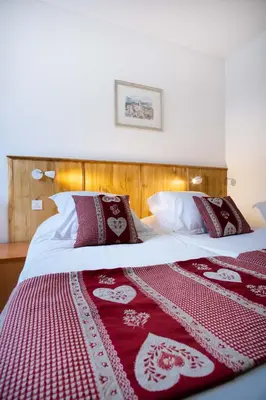 Un ou plusieurs lits dans un hébergement de l'établissement Hotel Relais d'ISSENHEIM Table d'hôtes