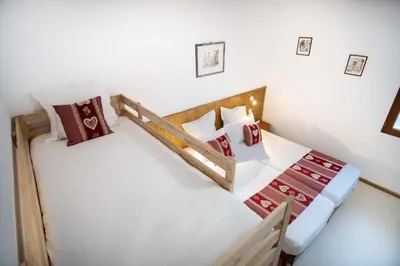 Un ou plusieurs lits dans un hébergement de l'établissement Hotel Relais d'ISSENHEIM Table d'hôtes