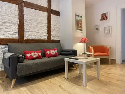 Coin salon dans l'établissement L'Ours de Colmar - Appartements en centre ville