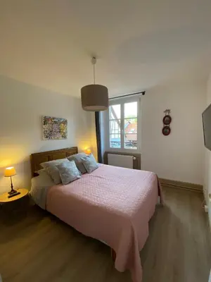 Un ou plusieurs lits dans un hébergement de l'établissement L'Ours de Colmar - Appartements en centre ville
