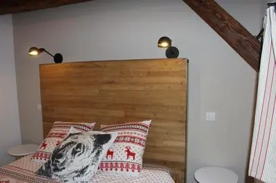 Un ou plusieurs lits dans un hébergement de l'établissement Gîte de l'ours grognon