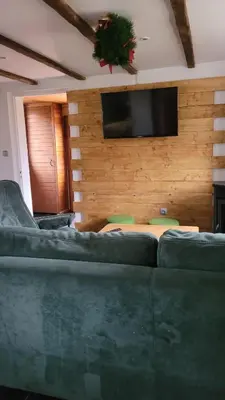 Télévision ou salle de divertissement dans l'établissement Gîtes Les Grandes Voies - Clé Vacances