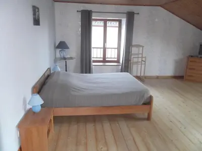 Un ou plusieurs lits dans un hébergement de l'établissement Gite le Sauceley Maison de vacances pour 6 à 10 personnes