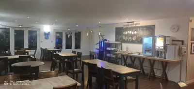 Restaurant ou autre lieu de restauration dans l'établissement Kyriad Mulhouse Est - Lutterbach