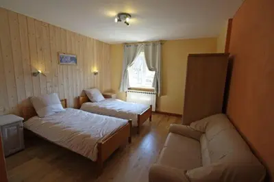 Un ou plusieurs lits dans un hébergement de l'établissement Gîte de la Lombarde