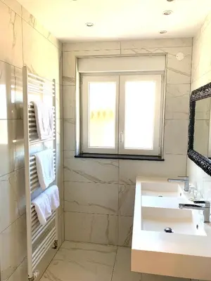 Salle de bains dans l'établissement Hotel Bristol