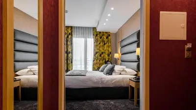 Un ou plusieurs lits dans un hébergement de l'établissement Hotel Bristol