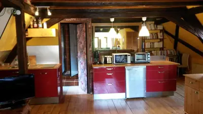 Cuisine ou kitchenette dans l'établissement Gîte 