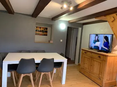 Télévision ou salle de divertissement dans l'établissement Gîte de Juliana 6 personnes