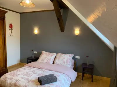 Un ou plusieurs lits dans un hébergement de l'établissement Gîte de Juliana 6 personnes