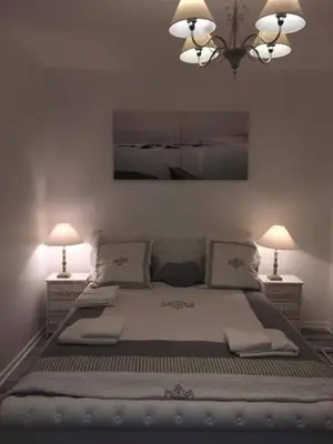 Un ou plusieurs lits dans un hébergement de l'établissement Apartments Center Colmar 5