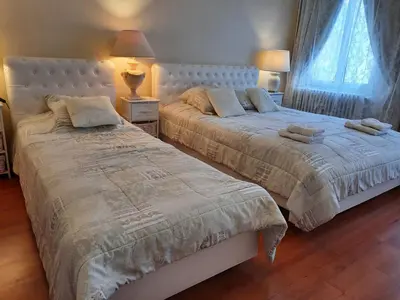 Un ou plusieurs lits dans un hébergement de l'établissement Apartments Center Colmar 5