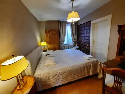 Un ou plusieurs lits dans un hébergement de l'établissement Apartments Center Colmar 5