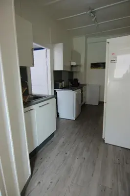 Cuisine ou kitchenette dans l'établissement Le Jules