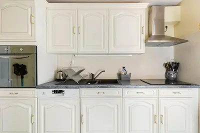 Cuisine ou kitchenette dans l'établissement Le Gîte de Sandra