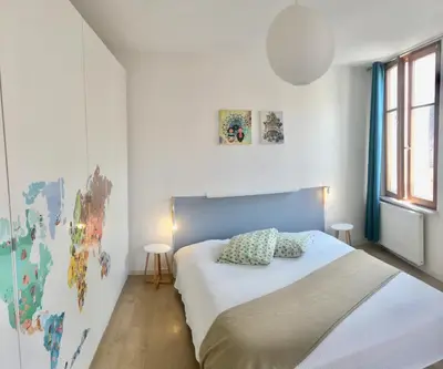 Un ou plusieurs lits dans un hébergement de l'établissement Gîte Atelier de Hansi - Colmar Centre