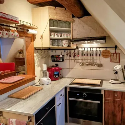 Cuisine ou kitchenette dans l'établissement Un balcon sur les toits