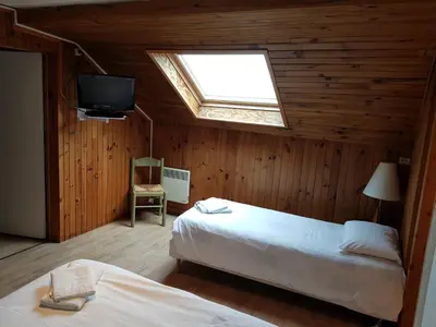 Un ou plusieurs lits dans un hébergement de l'établissement Mamyvonne Vacances