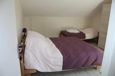 Un ou plusieurs lits dans un hébergement de l'établissement La Maison Jaune
