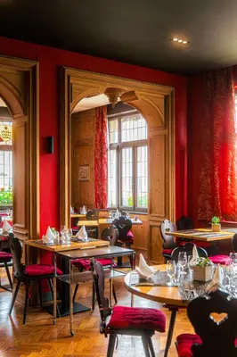 Restaurant ou autre lieu de restauration dans l'établissement Hotel Au Nid De Cigognes