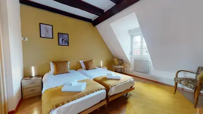 Un ou plusieurs lits dans un hébergement de l'établissement Aux Bijoux de Colmar - Le Saphir - 1 PARKING GRATUIT