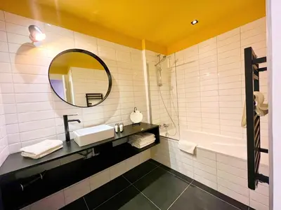 Salle de bains dans l'établissement Hôtel Restaurant Vaillant proche Europapark