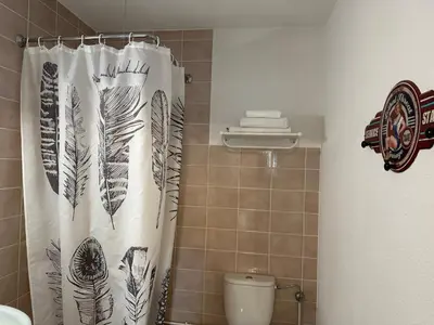 Salle de bains dans l'établissement Hotel Porte de France - Self Check In by Homenhancement