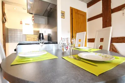 Cuisine ou kitchenette dans l'établissement Gîte Par ci, Par là