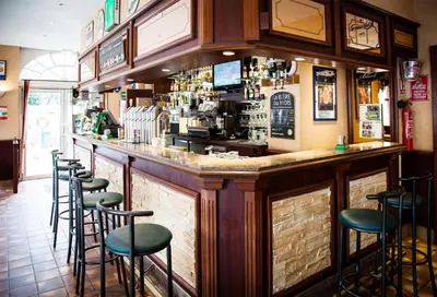 Salon ou bar de l'établissement Hôtel Bar Des Vosges